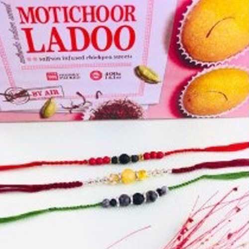 Good Luck Stone Three Rakhi Set with Motichoor Ladoo 